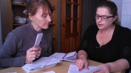 Tatiana Mironova and Irina Kravets examining documents of the state officials on Elvira’s case